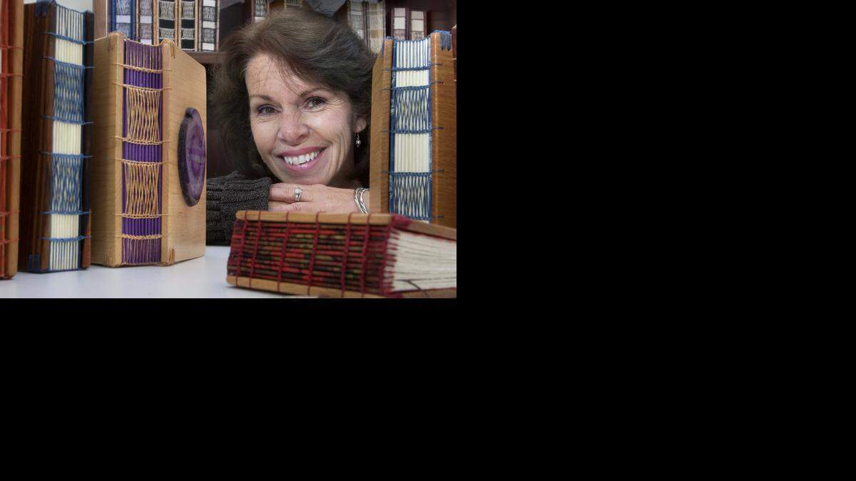 
Kate Henrich of Overland Park has spent the past year mastering the art of bookbinding and launching her Woodland Road line of books with custom-finished wood covers.

