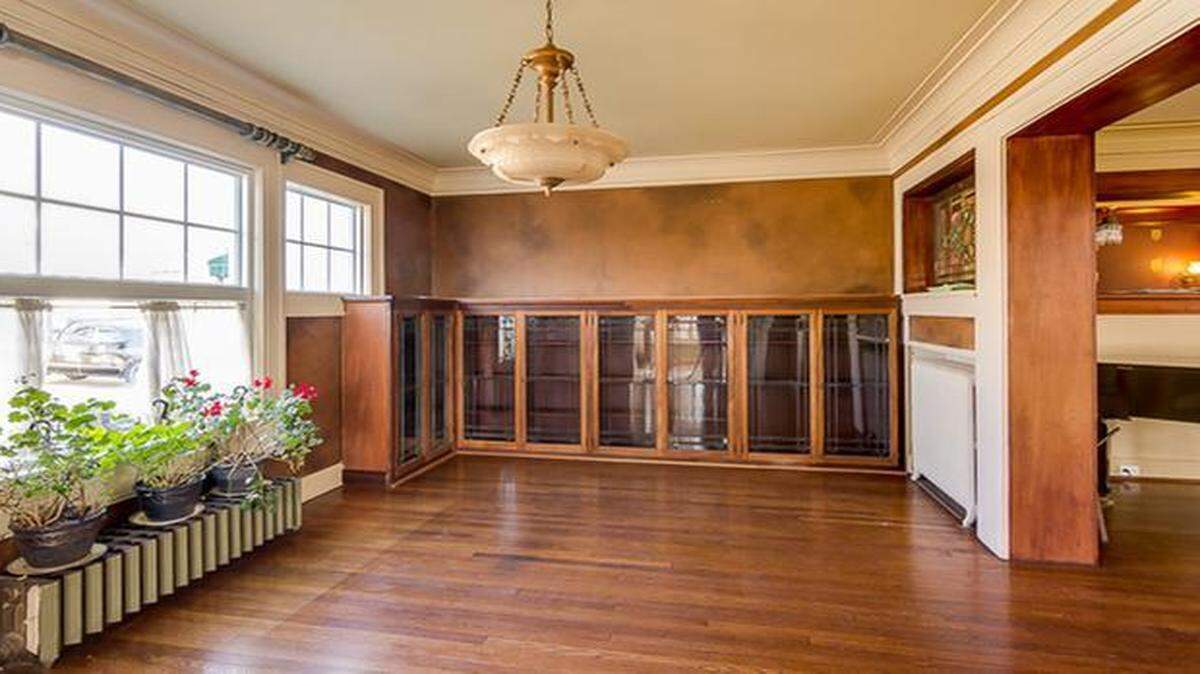 Madi Mali Homes is painting the walls black above the original bookshelves in the Symphony Showhouse’s library. A large brass globe chandelier will hang above a desk and fur rug.