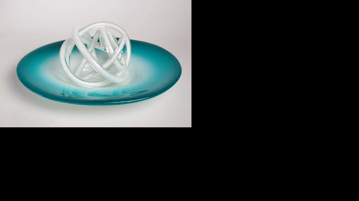 
Aqua dream plate ($70) and white glass sculpture ($19), both from Trapp & Co.
