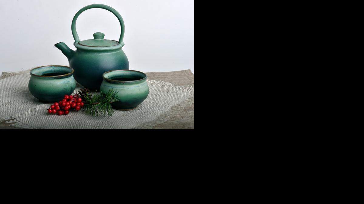 
The ceramic tea pot ($50) and tea cups ($12 each) from World’s Window.
