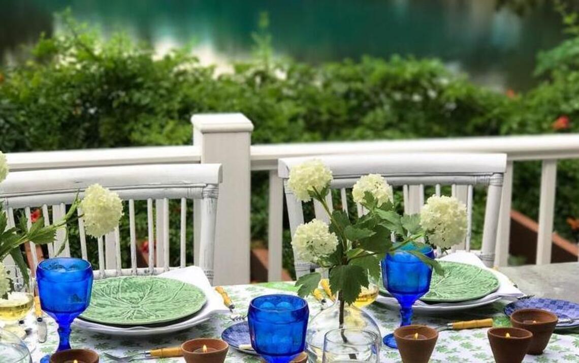Beautiful tablescape is the centerpiece of an alfresco dinner party