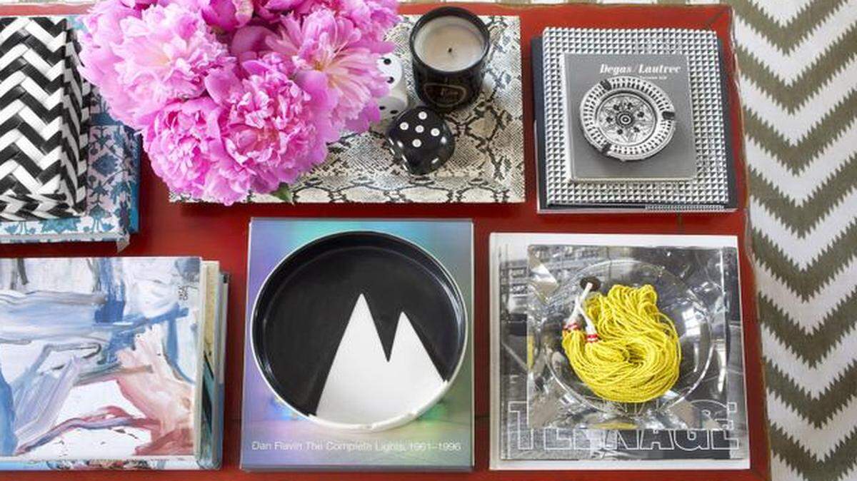 
Use decorative trays to bring order to a colorful table.

