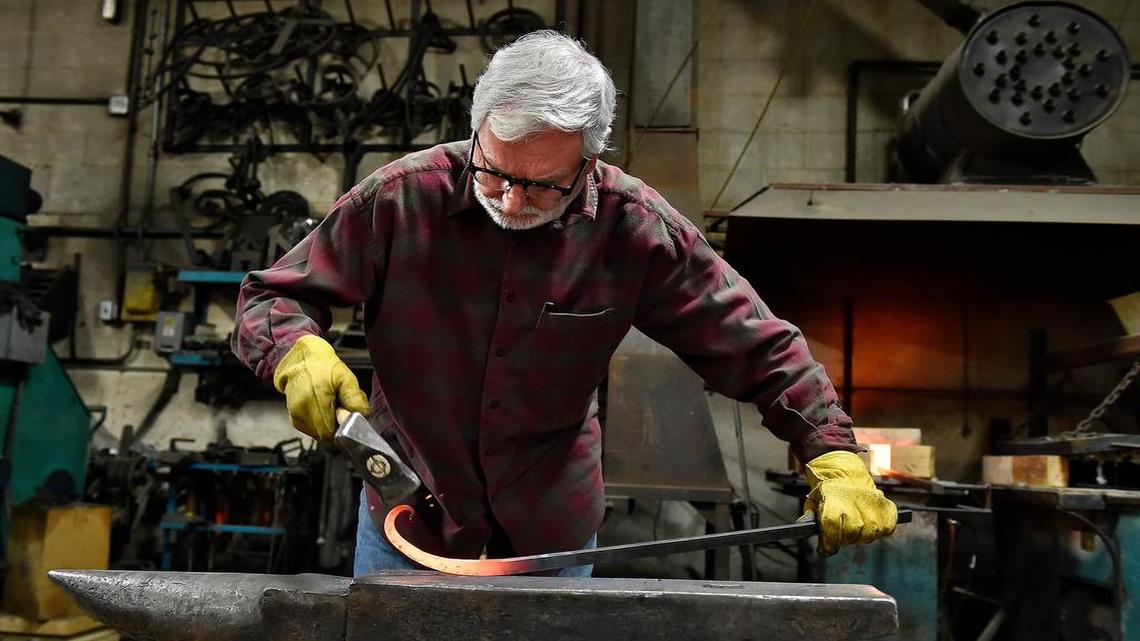 Steve Austin of Austin’s Iron Works in Claycomo forges a scroll detail for a gate. He’s been a blacksmith for 43 years and his work is in such prestigious homes as that of philanthropist Julia Irene Kauffman.