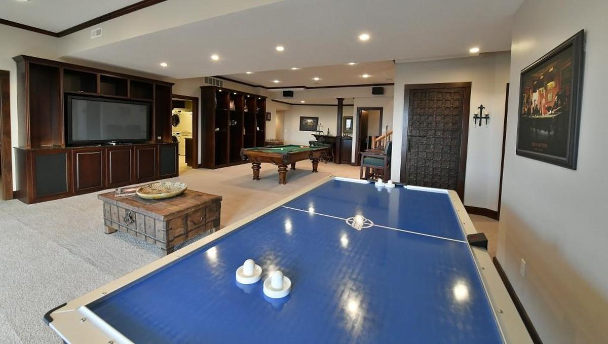 Former Kansas City Royals pitcher Kevin Appier’s mansion near Paola, Kansas has a recreation room with air hockey, a billiard table, large-screen television and full-size wet bar.