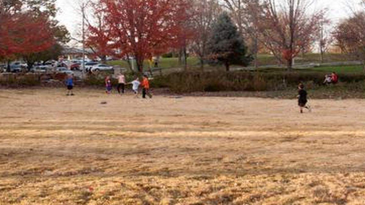 
Kim and Joe Ungashick were married on a plot of land next to their home near Loose Park. Now, they have turned it into a baseball diamond where the neighborhood kids are welcome to play. 
