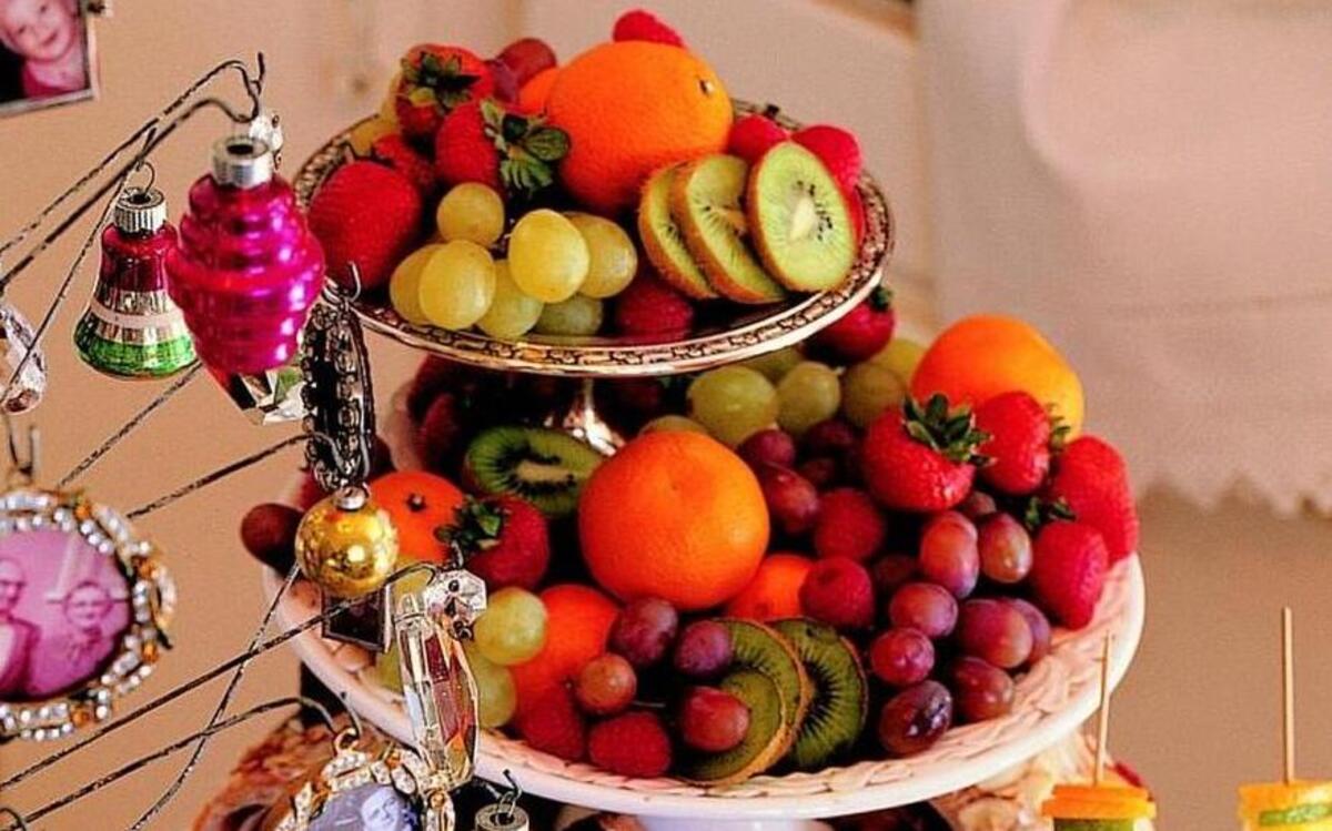 Pull out a tiered server and fill it with easy foods guests can enjoy as they drop in on New Year’s Day.
