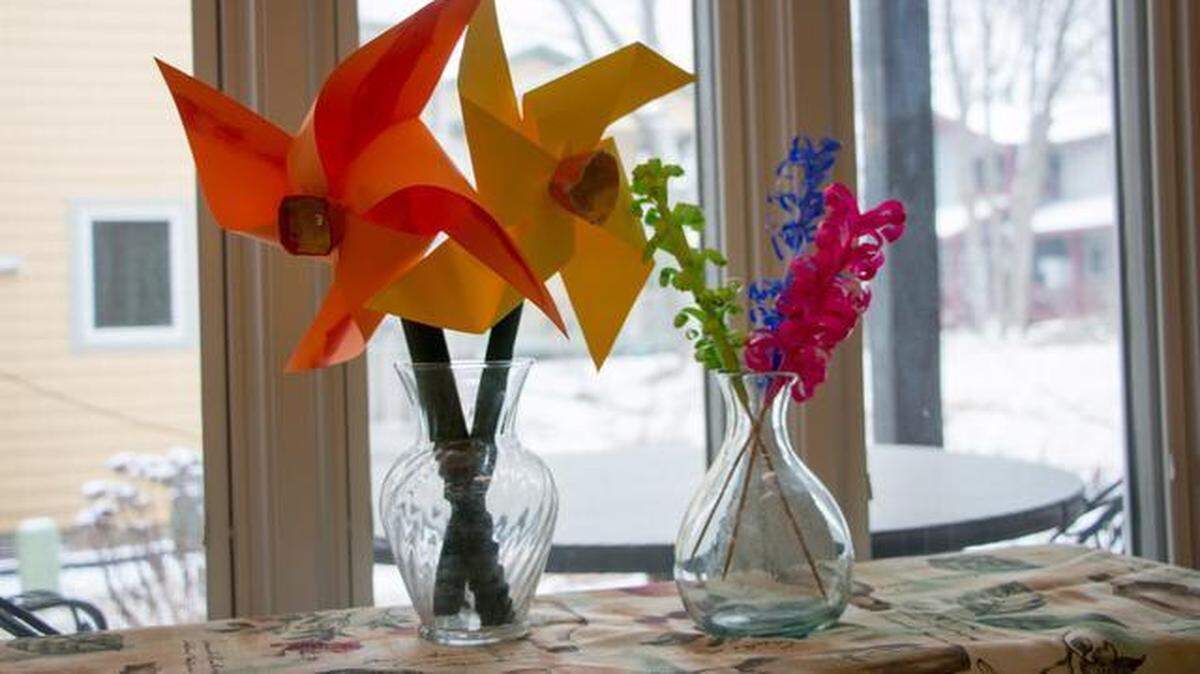 
Paper pinwheel daffodils and curly hyacinth are colorful but a chore to create.
