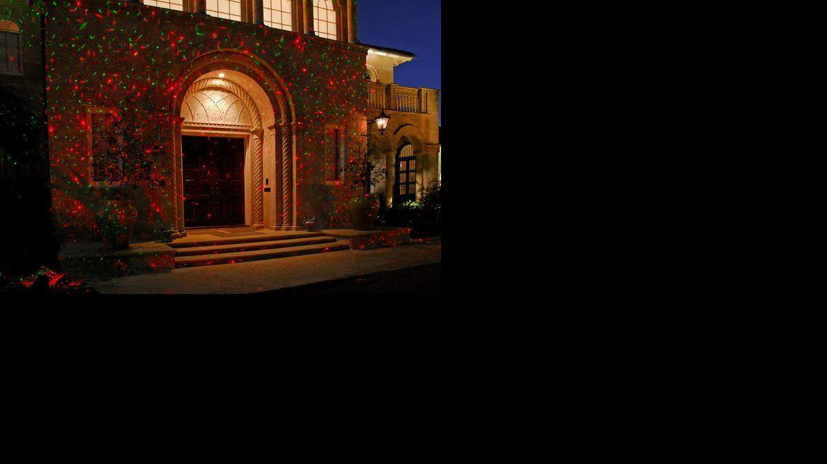 
Homeowners looking for something unique in holiday lighting can find it in projected laser lights. 
