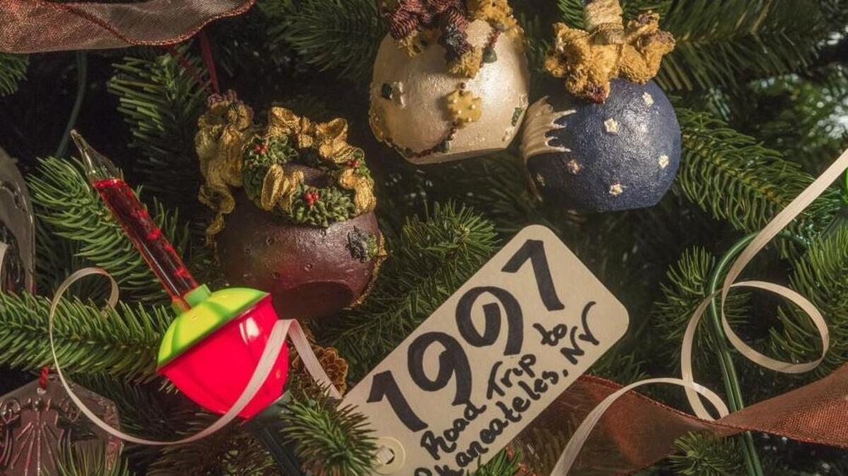Patti Downey’s memory garland features cards with the dates of memorable events in her life.