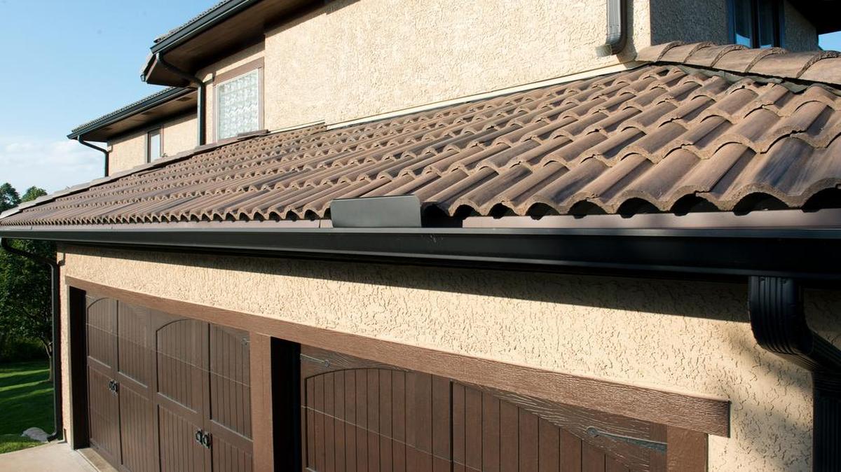 An Overland Park home features a suede-color concrete tile roof.