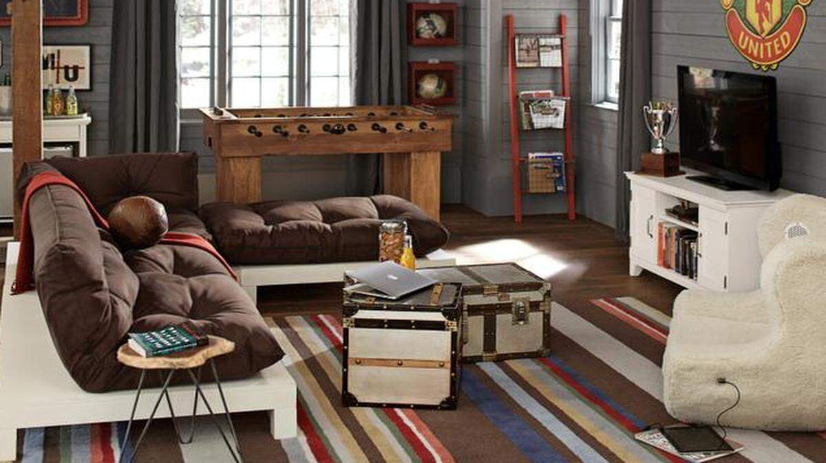 
 Trunks serve as mini individual dining tables, storage for blankets and out-of-season items, or as tidy-up receptacles when guests arrive. 


