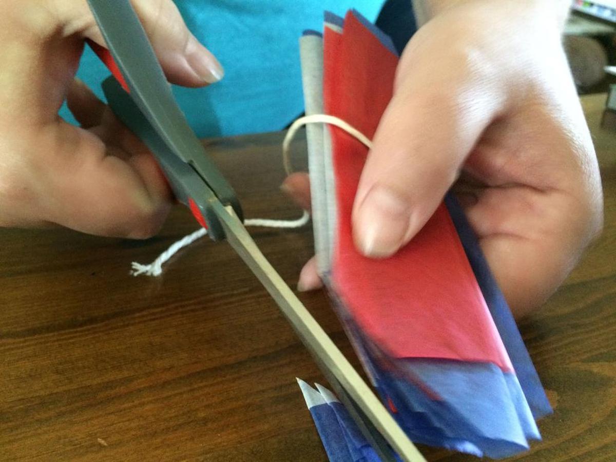 Cut the edges of the folds into angles.