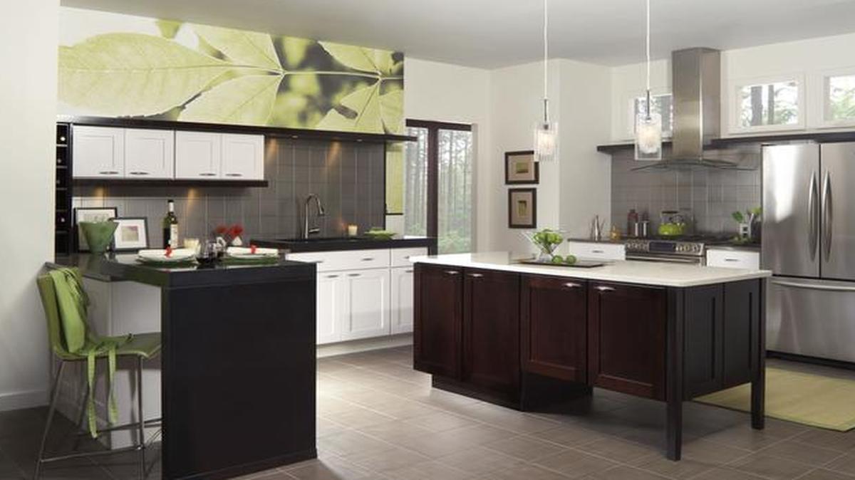 Designers are predicting that wallpaper with natural themes will be back. So will kitchen cabinets that look like furniture, such as the Tolani island from Merillat’s classic collection.