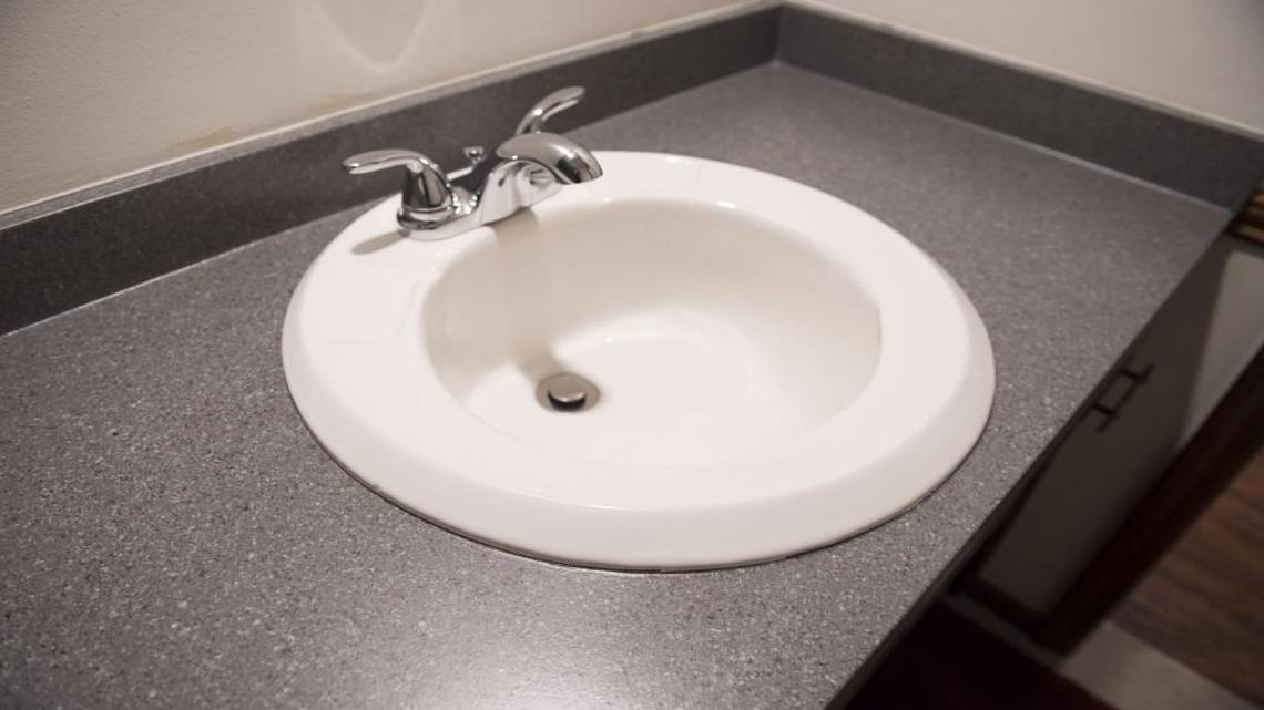 Dan Miller chose a dark gray granite finish for his countertops. The refinishing material comes in a vast array of colors.