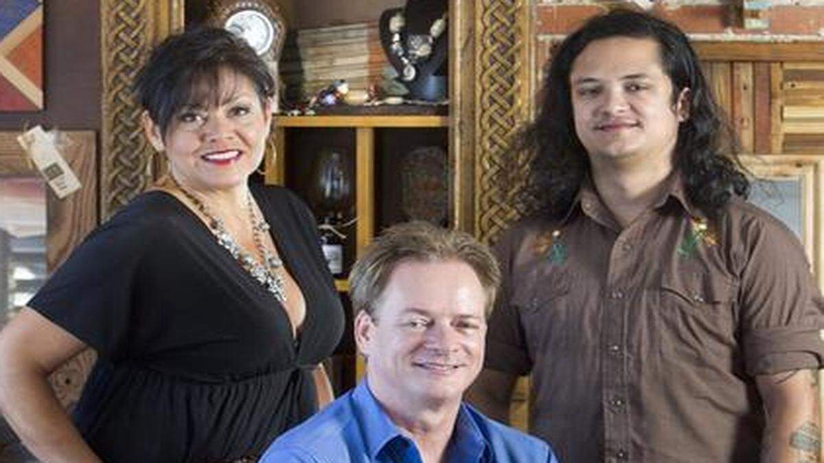 Woodworker and musician Ian Byrne is pictured with his son Kian and his sister-in-law Elizabeth Quinn-Babcock, who works at his shop, Byrne Custom Woodworking in Lenexa.