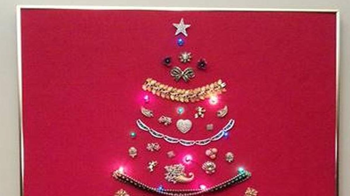 Betty Reed and her sister created this tree from lights and their grandmother’s costume jewelry.