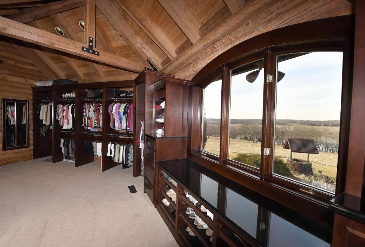 Not only are the walk-in closets in Kansas City mansions big, but they’re beautiful, with wood paneling and custom cabinets that look like something out of a high-end clothing boutique or haberdashery. This one also offers stunning outdoor views.