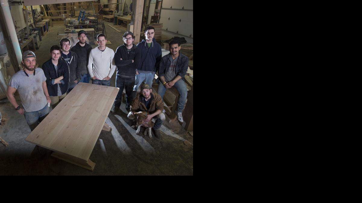 
The staff of Unruh Furniture: (standing, from left) Drew Sherwood, Ben Jones, Ben Nazworthy, Jacob Burkhalter, owner Sam Unruh, Josiah Thill, Cameron Reed and Robb Cortes. Cody Grube is kneeling with Pete the pooch.
