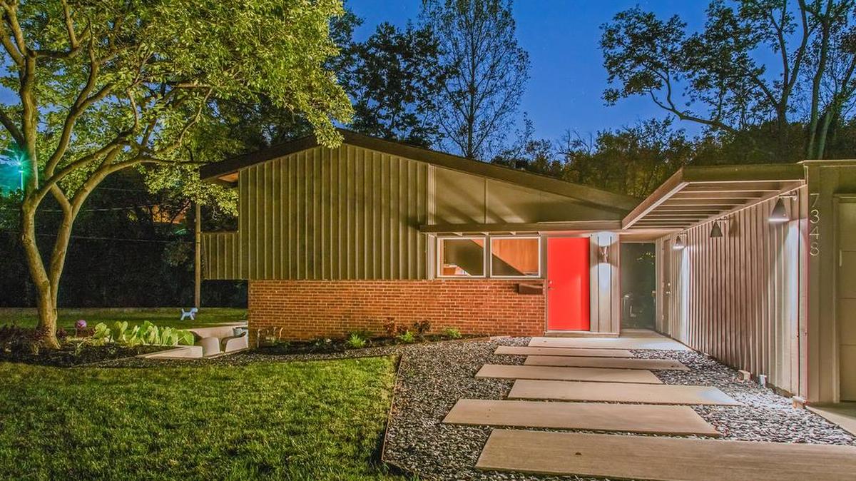 
The front of the home looks a lot like it did 65 years ago, with the exception of the mature trees and concrete and slate chip path. It was the first home that Drummond built in a modern style for the masses in KC. Previous homes had been custom built.
