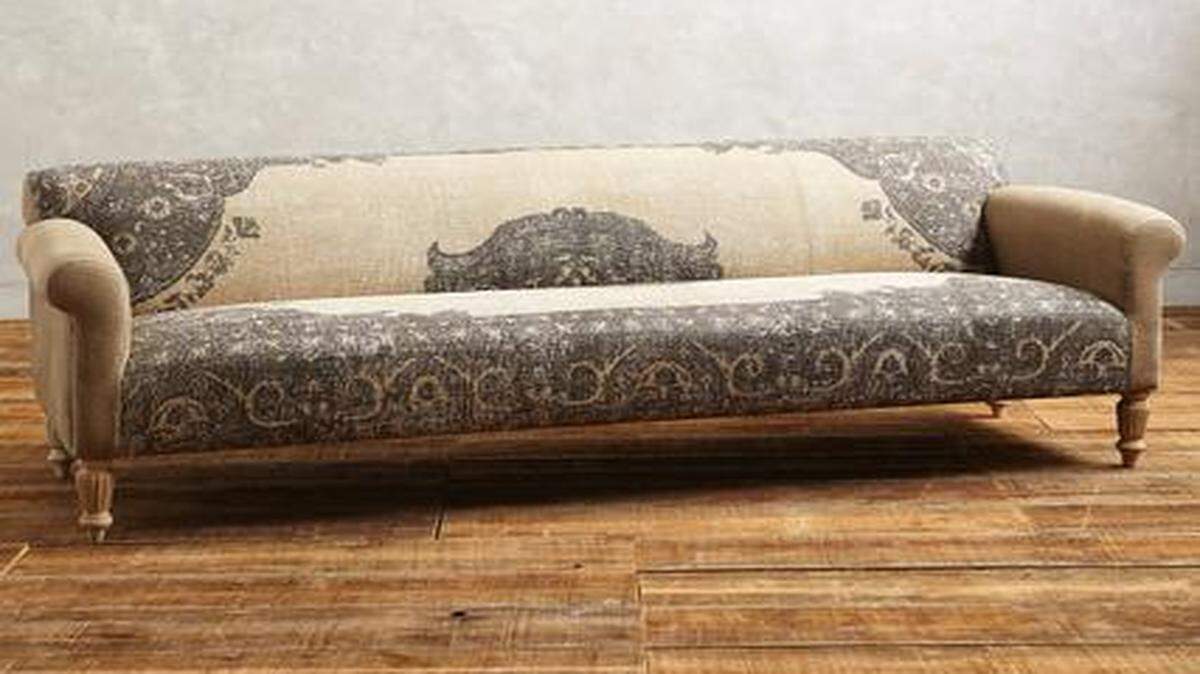 
The Dhurrie ($1,998)sofa has cotton-wool upholstery and a distressed mango frame.
