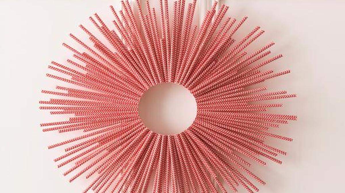 
Dozens of striped straws form this wreath created by Style at Home design contributor Stephanie Hung. 
