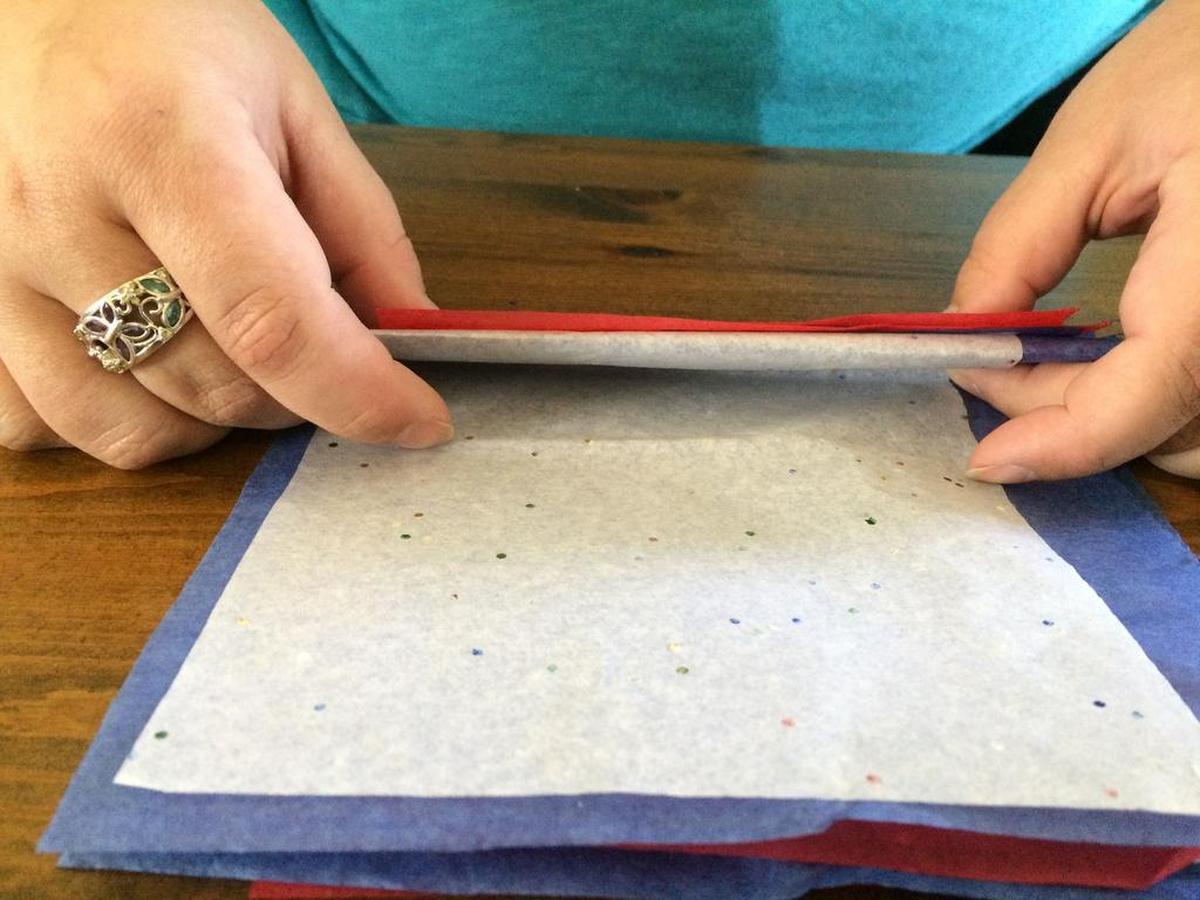 Fold the tissue paper accordion-style.