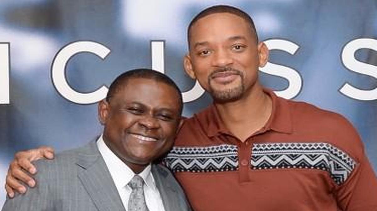 Forensic pathologist Bennet Omalu (left) is played by Will Smith in “Concussion.” The movie chronicles Omalu’s discovery of a condition he named chronic traumatic encephalopathy found in the brains of football players.