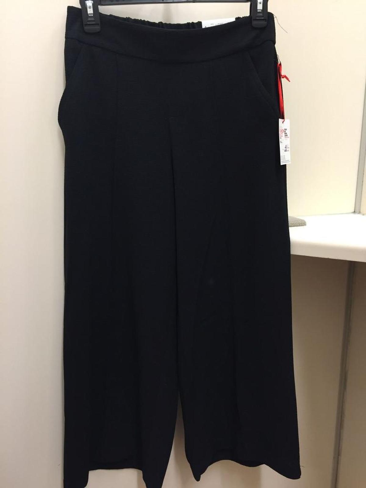 Swingy trousers are in style this season, but they can be tricky to pull off. This black pair (Elle, $54) would look darling with any structured, fitted top. These would probably look best with a heel (wedges are your friend), but a strappy, flat sandal would look great, as well.