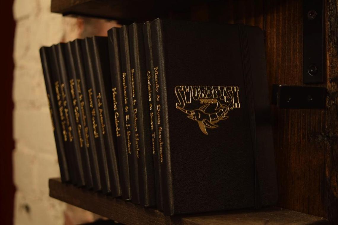 Swordfish Tom’s Little Black Book Club ($100 per person, or $150 if a pair shares) — A membership in Swordfish Tom’s Little Black Book Club includes a customized book for jotting down tasting notes, recipes and memories, as well as exclusive access to limited allocation spirits. www.facebook.com/Swordfish-Toms-1616559905309245/