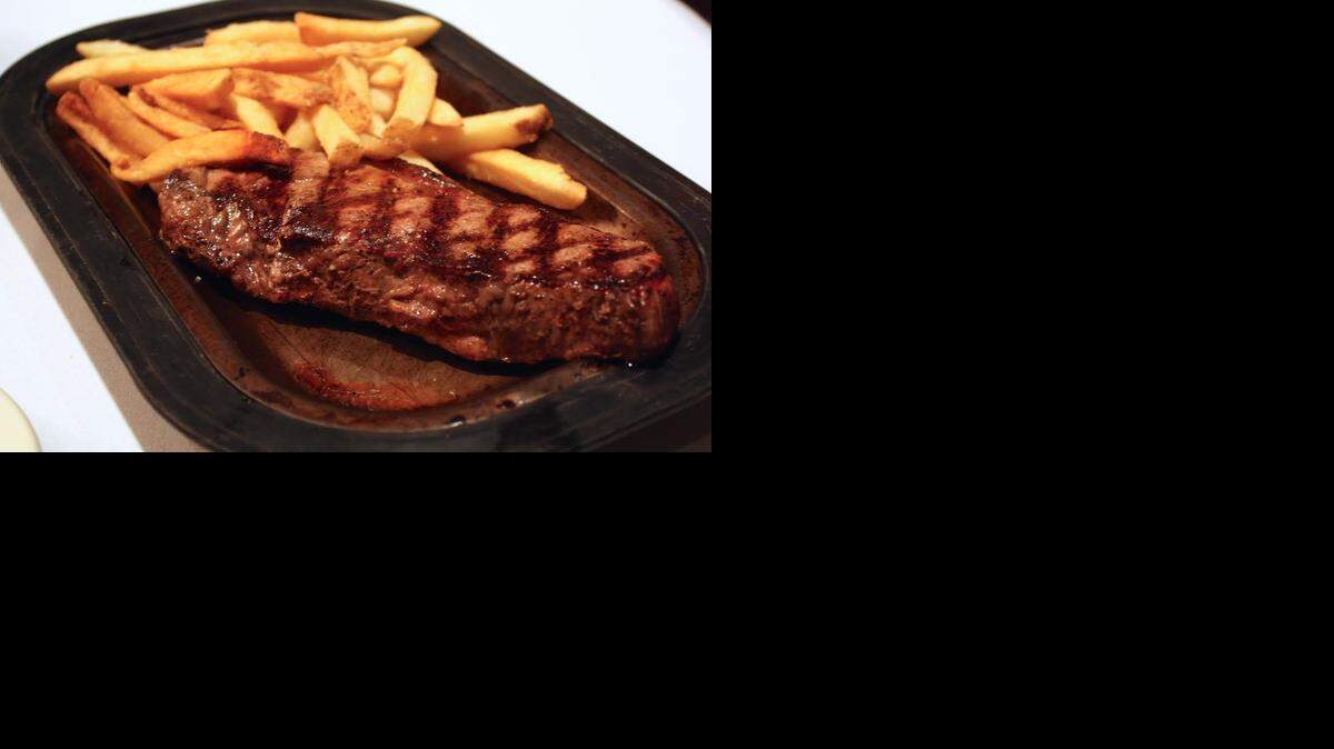 10-ounce KC Strip steak and fries at Hereford House. An employee was charged with unlawfully tampering with food at the Hereford House at 5001 Town Center Drive in Leawood.