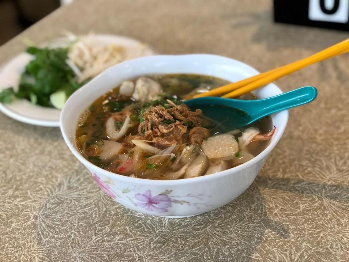 Cafe Ha Tien serves a seafood noodle soup swimming with slippery rice noodles, shrimp, scallops and crab meat.