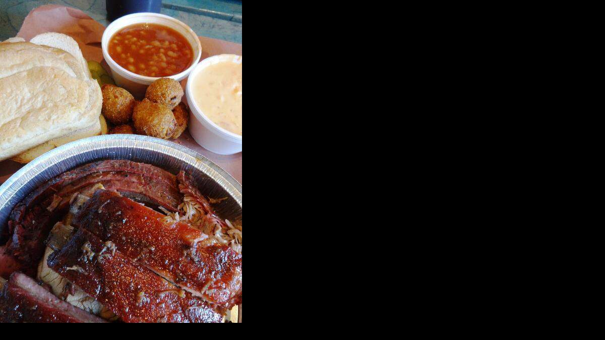 
Slap’s ribs, brisket, pulled pork, sausage, hushpuppies, beans and cheesy corn.
