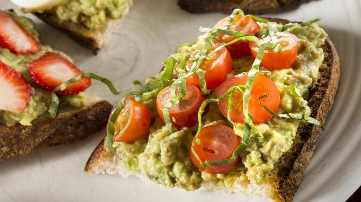 Avocado toast with cherry tomatoes and basil. Food styling by Kathy Moore and Roxanne Wyss/Special to The Star.