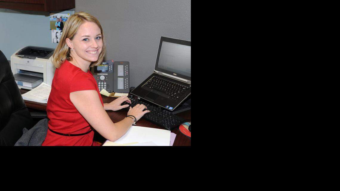
Courtney Fitzgerald at her desk
