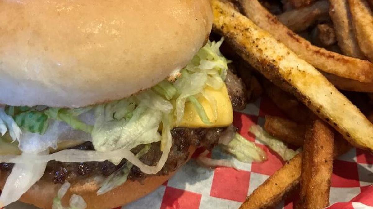 Tay’s offers organic, grass-fed beef burgers (standard toppings are lettuce, tomato, pickle and cheese), sauces on the side and a choice of add-ons — chili, cheese sauce, jalapenos, raw or grilled onions, bacon and mushrooms.