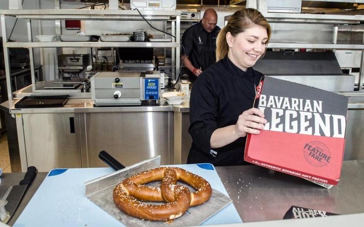 The star of AMC’s new Feature Fare menu is the Bavarian Legend, a 1.5-pound pretzel served with mustard and cheese dipping sauce. Jessica James, director of culinary, helped develop the pretzel and 10 other new menu items for Feature Fare, which she says “is reinventing how folks think about the concession stand.”