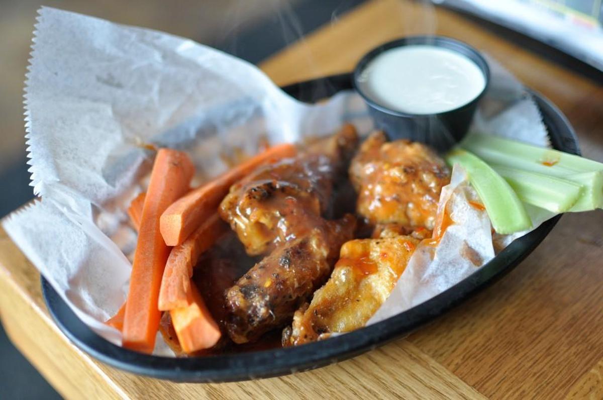 Want your wings hot, but not too hot? Order Grinders’ Death Wings with Molten sauce (and steer clear of the super-hot Death Nectar).