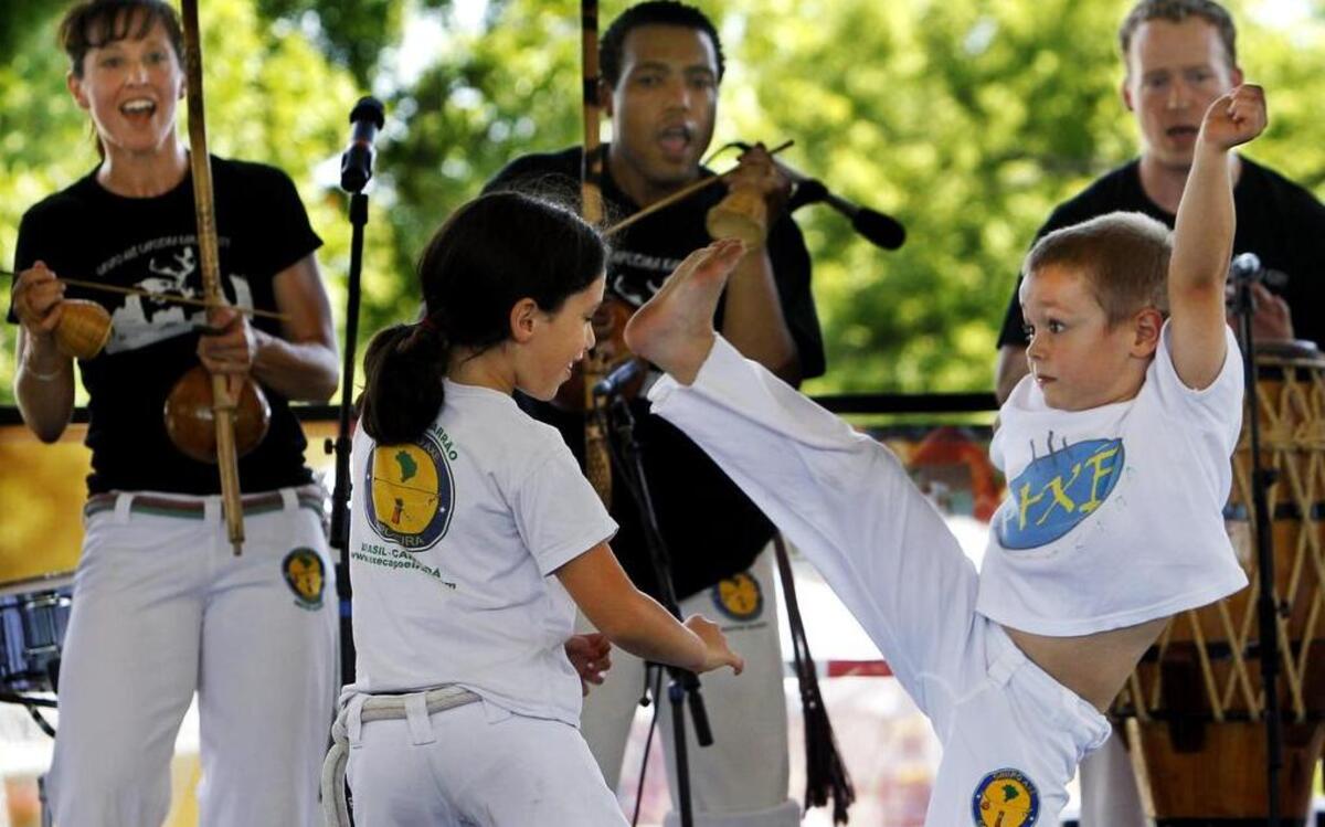 
Axe Capoeira & Grupo Tropicalia show off their capoeira skills back in 2011. 
