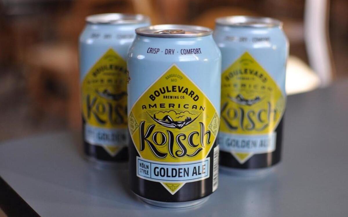 Cans of American Kolsch feature a man lounging in a hammock. The easy-drinking golden ale was inspired by the pale, crisp Kölsch beers produced in Cologne, Germany.