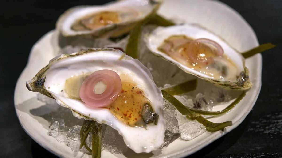Oysters with condiments is photographed in 2017 at Corvino Supper Club & Tasting Room.