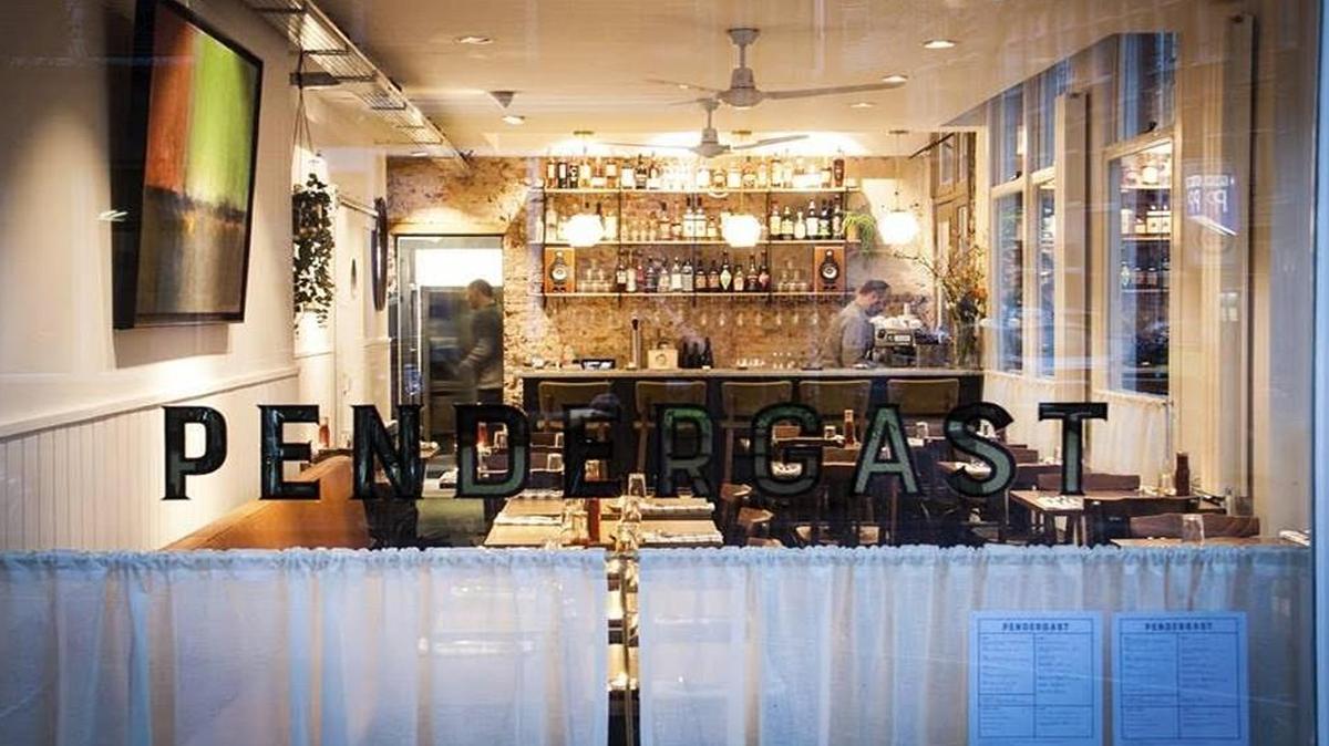 Pendergast Smokehouse through front window looking in.