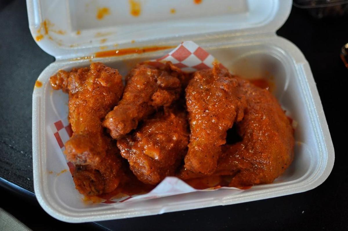 Wings Cafe offers several takes on classic Buffalo wings, including breaded (shown here), Cajun Buffalo and Italian Buffalo.