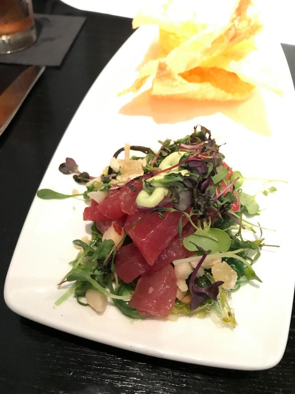The Bristol Seafood Grill serves poke as an appetizer.