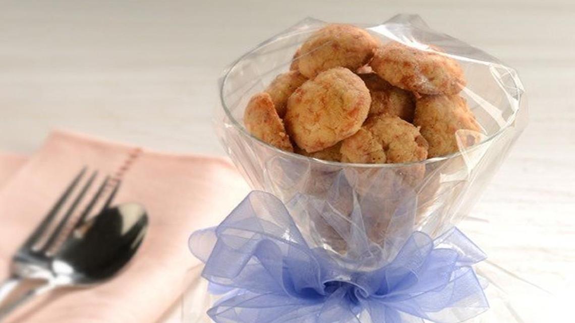 Itty-bitty cheese bites can be served wrapped, in stemmed glasses.