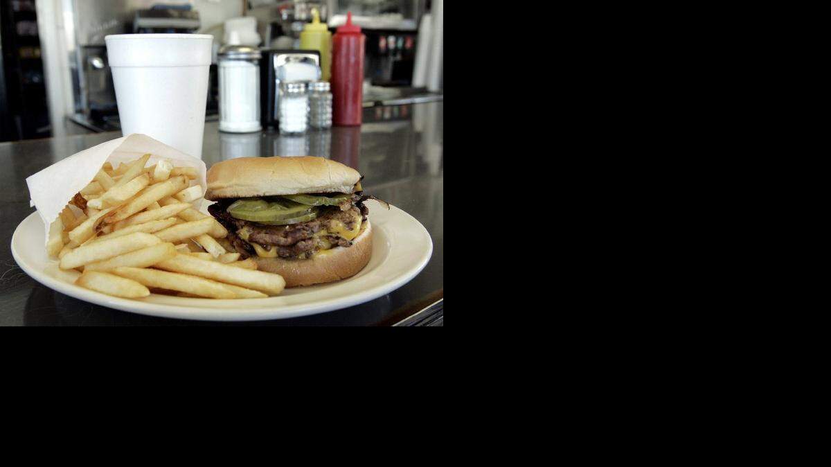 Town Topic’s double cheeseburger, fries and chocolate shake.