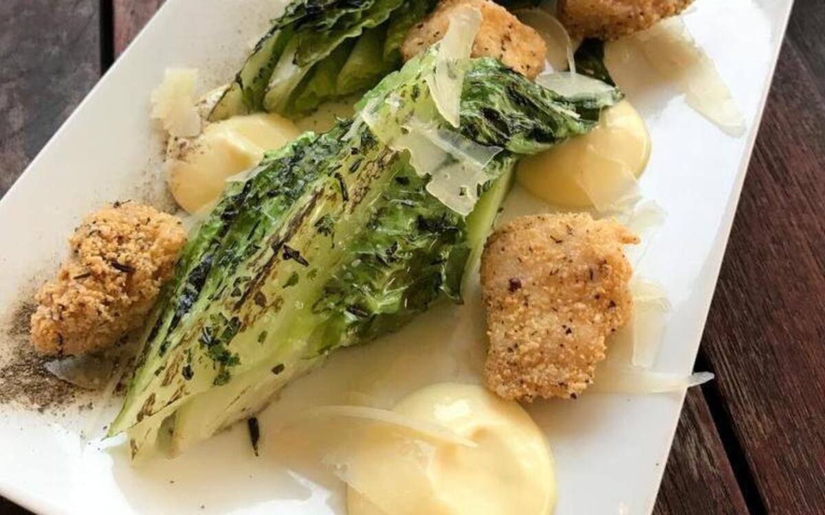 Jonathan Justus’ Missouri Caesar salad features catfish “croutons” and a luxurious house-made dressing. The dish is currently on the bar/patio menu at his Smithville restaurant, Justus Drugstore, and will be on the menu at Black Dirt, his Kansas City restaurant scheduled to open in the fall.