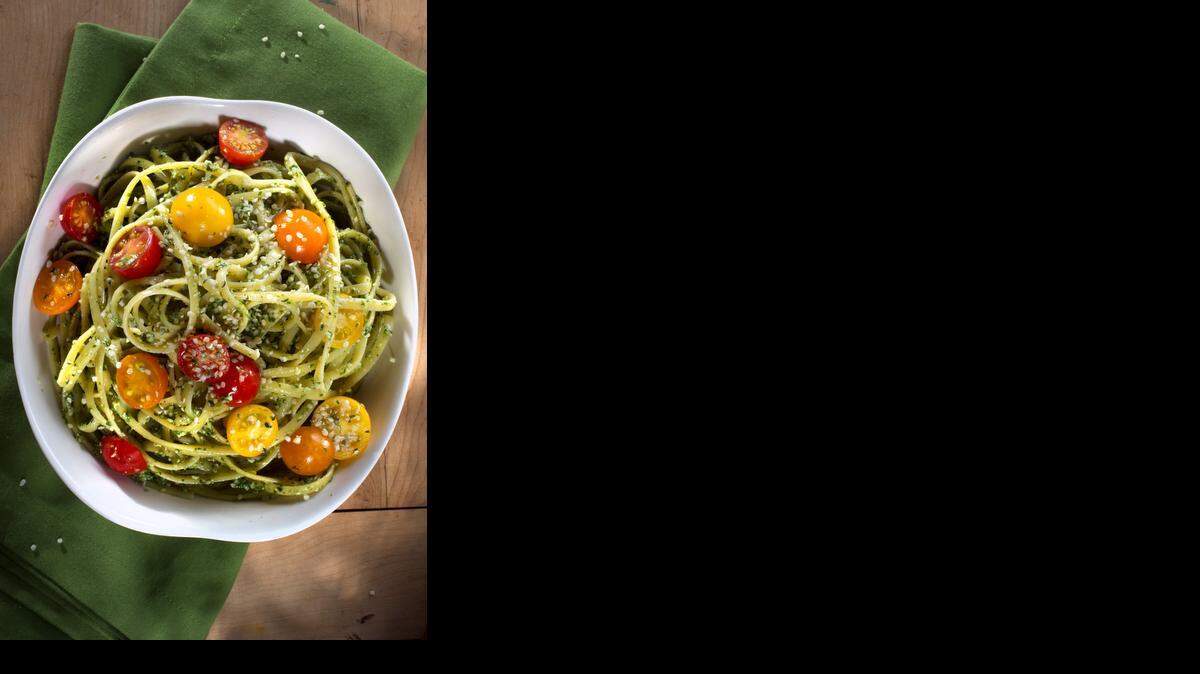 
Happy Nut-Free Pesto with pasta and cherry tomatoes.
