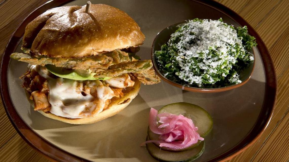 
The Jackknife sandwich at the Char Bar features a Kale-Pecorino Slaw side item. The restaurant is at the north end of 4050 Pennsylvania Avenue in Westport.
