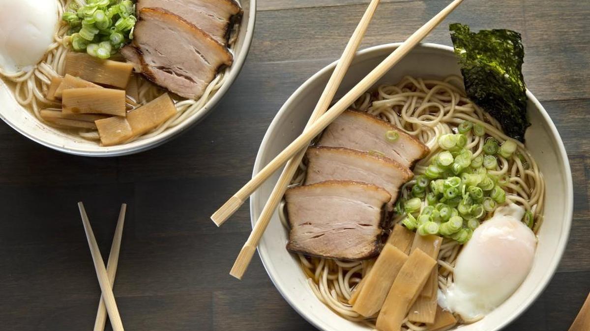Ramen by Chef Patrick Curtis at Shio Noodle Shop, 3605 Broadway in Kansas City, includes Shio (left), a sea salt based ramen, and Shoyu, a soy sauce based ramen. Both are topped with a slow-cooked egg, pork belly and green onion.