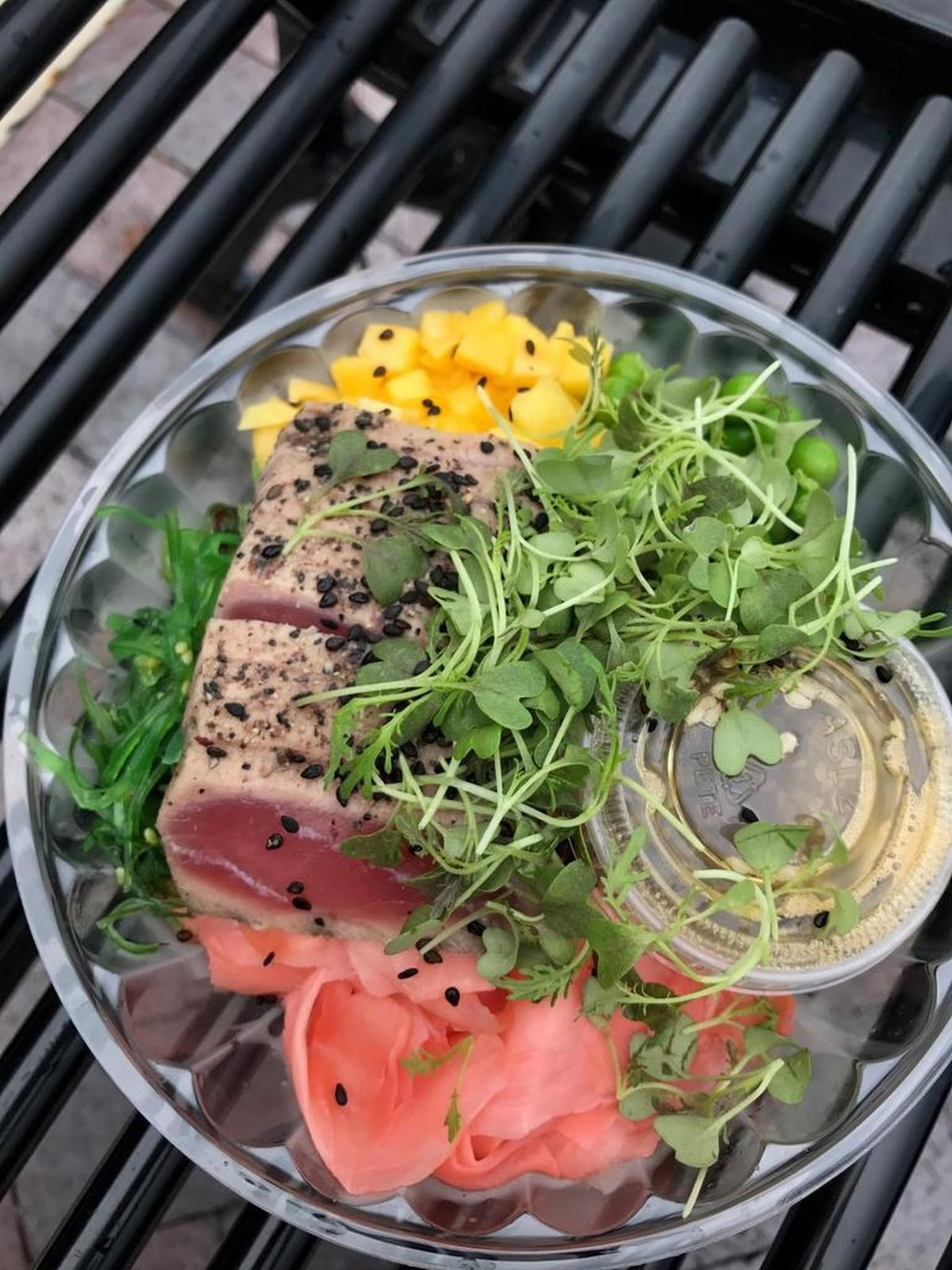 Unbakery & Juicery serves its poke bowl with brown quinoa instead of rice and slices and sears the tuna.